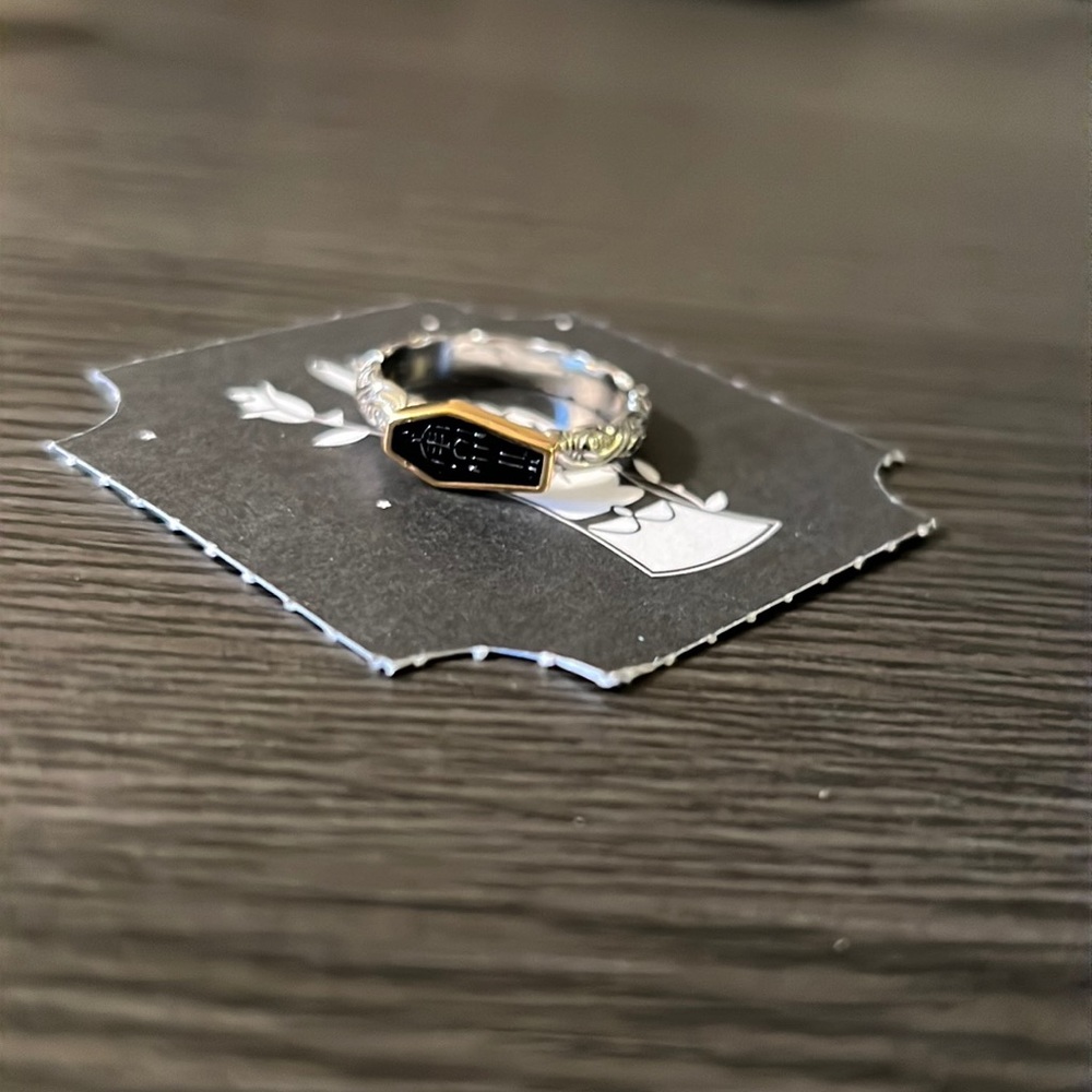 Coffin ring with skeleton